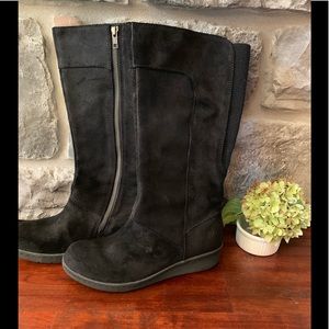 A new black leather boot